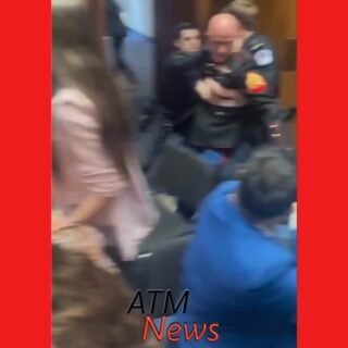 Oops! An anti-Iran War protester named #BrianMcGinnis, who describes himself as a Marine veteran running as a Green Party candidate in North Carolina’s Senate race, interrupted a #Senate hearing on Wednesday.—Things escalated quickly when U.S. Senator #TimSheehy joined the Capitol Police to remove McGinnis. His arm got stuck in the door, and bystanders yelled that the senator had broken his hand.—McGinnis was arrested and taken to the hospital. He is facing three counts of assaulting a police officer, three counts of resisting arrest, and one count of crowding, obstructing, and incommoding.